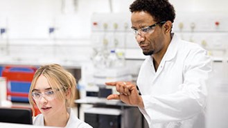 Two Researcher Having Discussion